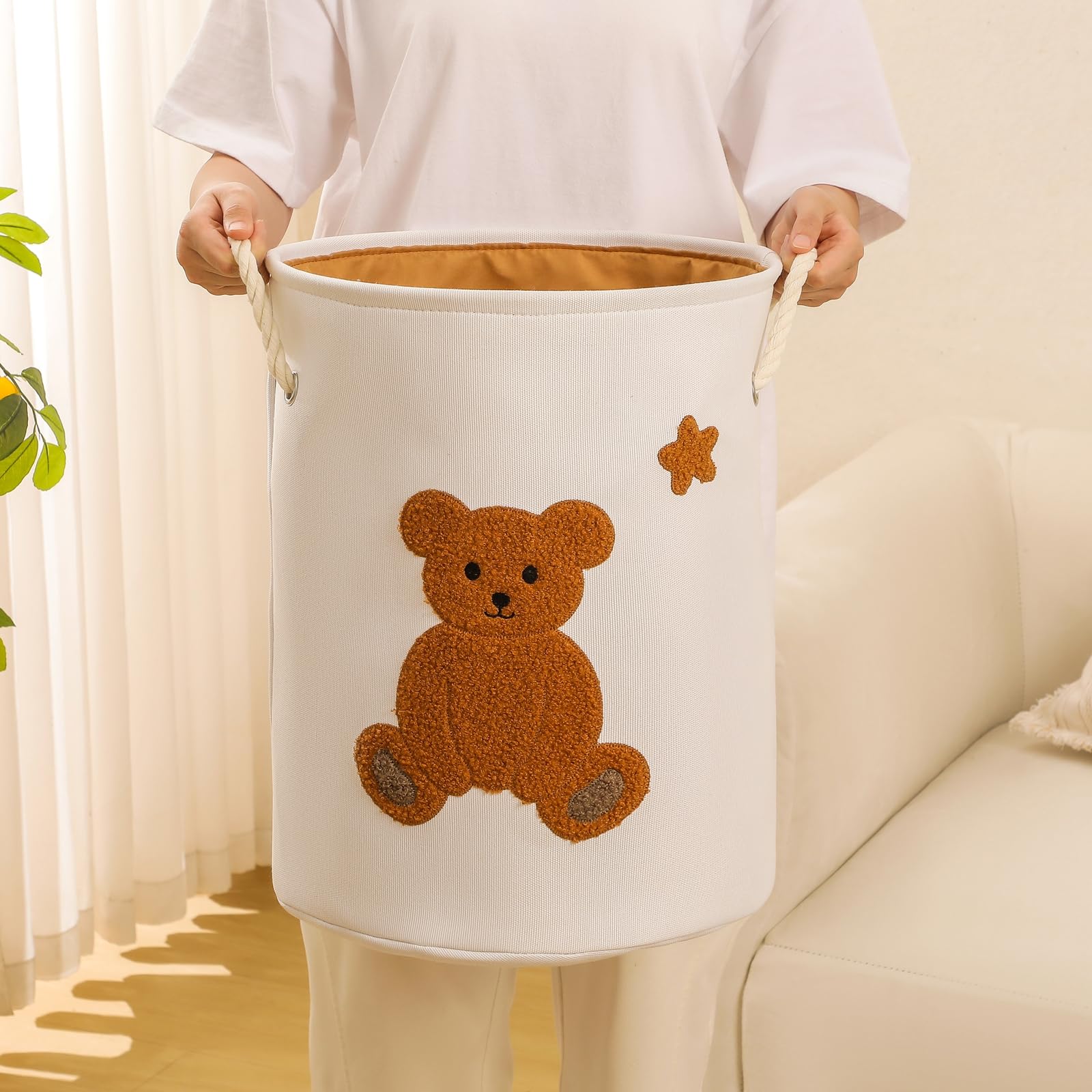 INough baby-room decor basket blends practicality with cute bear charm.