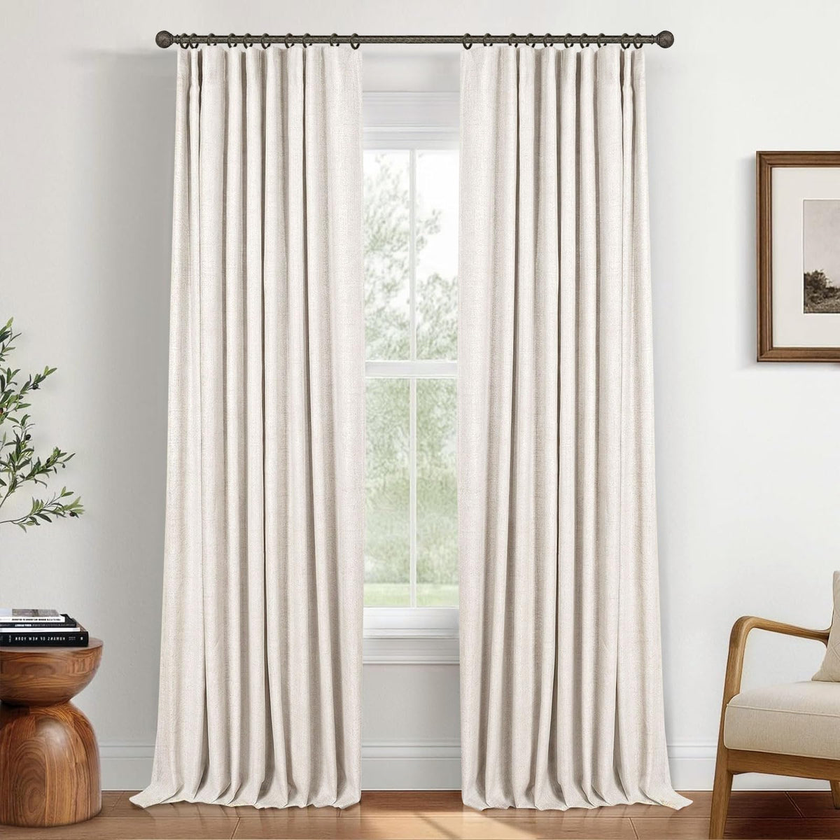 INOVADAY beige blackout curtains offer serene, dimmed lighting in a living room.