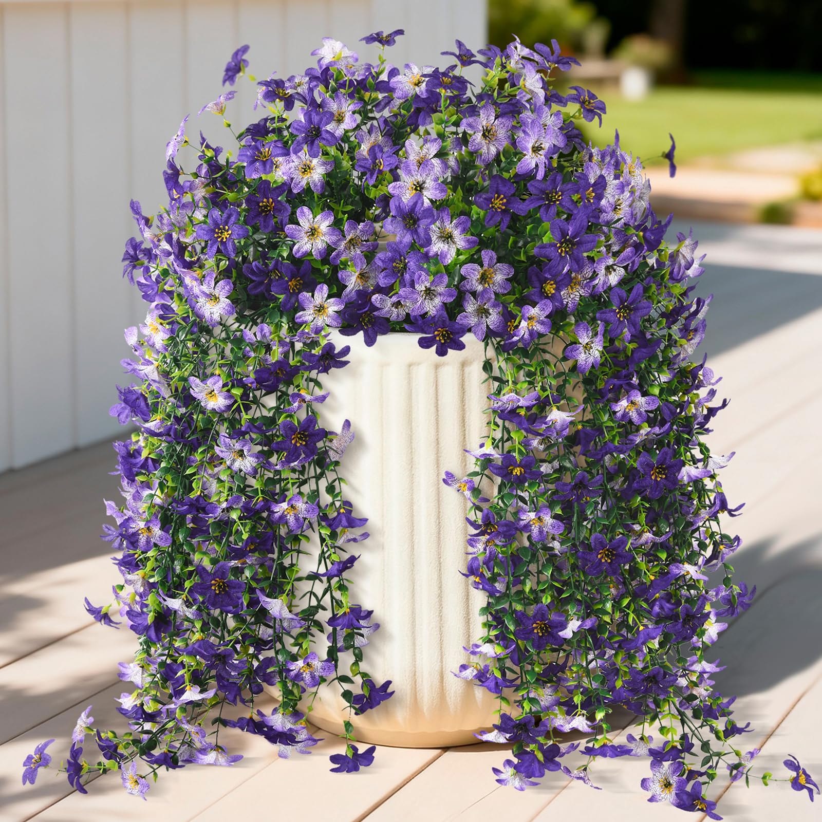 INQCMY artificial daisy hanging flowers for outdoor décor add year-round charm.