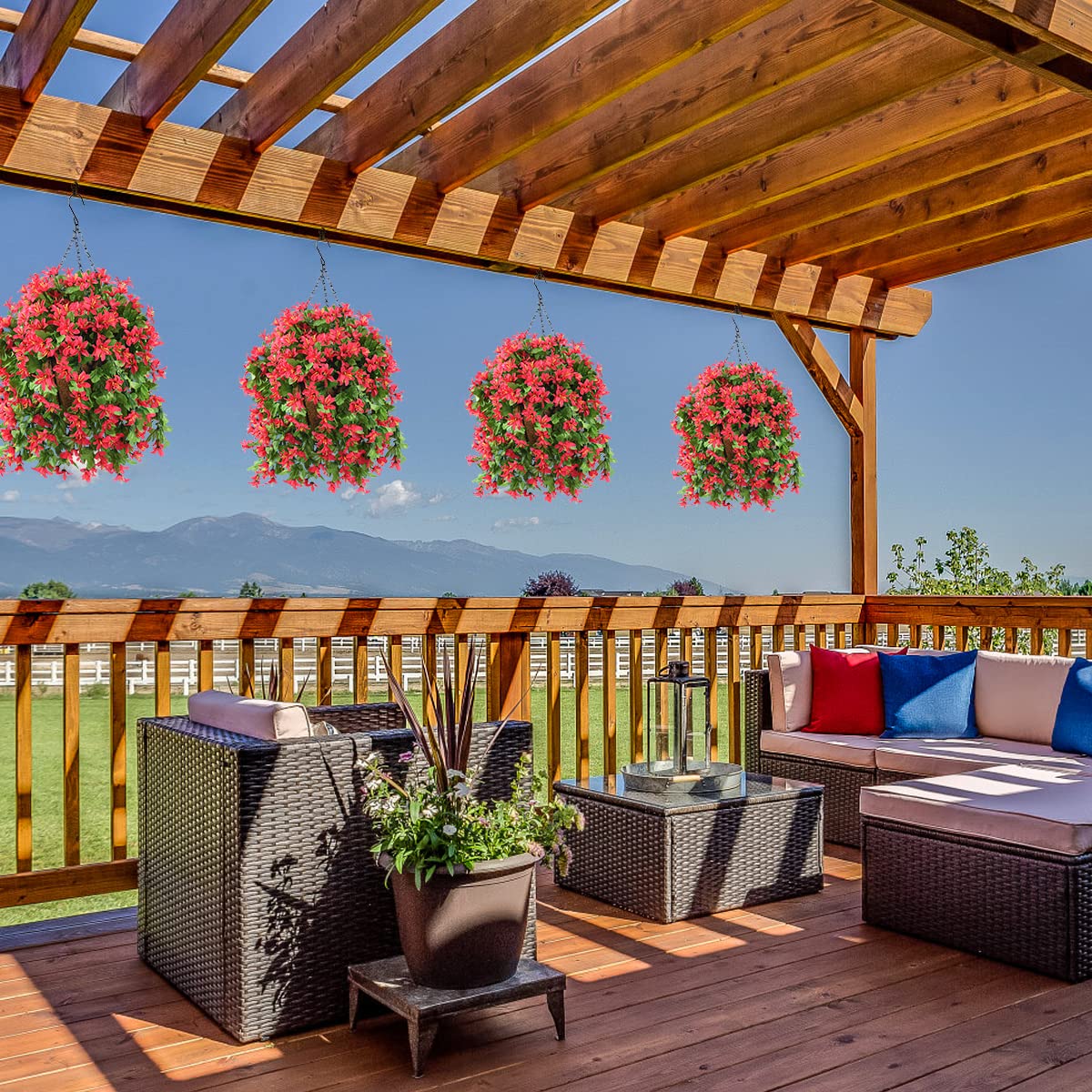 INQCMY outdoor-friendly hanging flowers on a patio for vibrant porch decor.