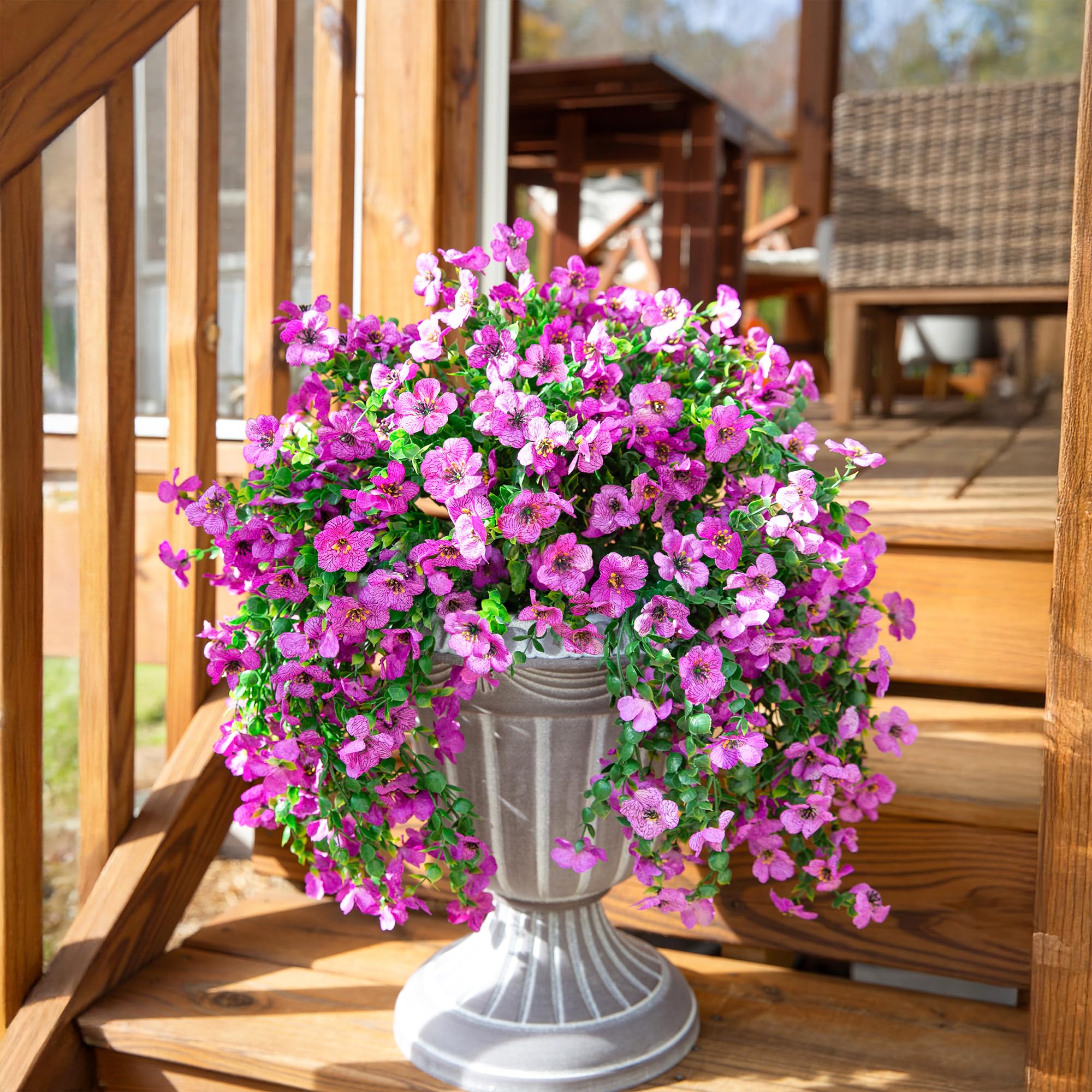 inspring hanging flower bundles with violets and eucalyptus brighten porches and patios.