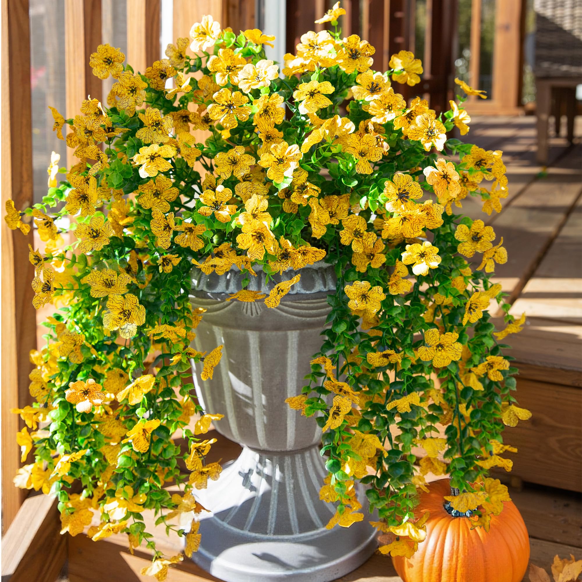 INSPRING yellow daisy faux outdoor bundles shown for year-round curb appeal