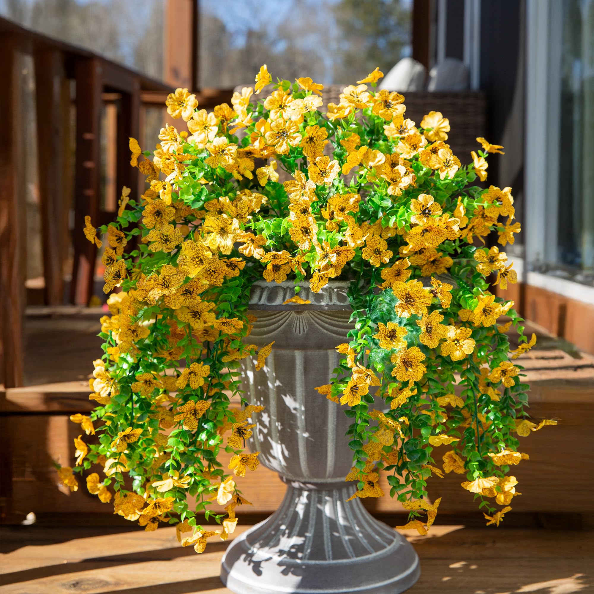 INSPRING urn planter accent with faux daisies for year-round outdoor charm