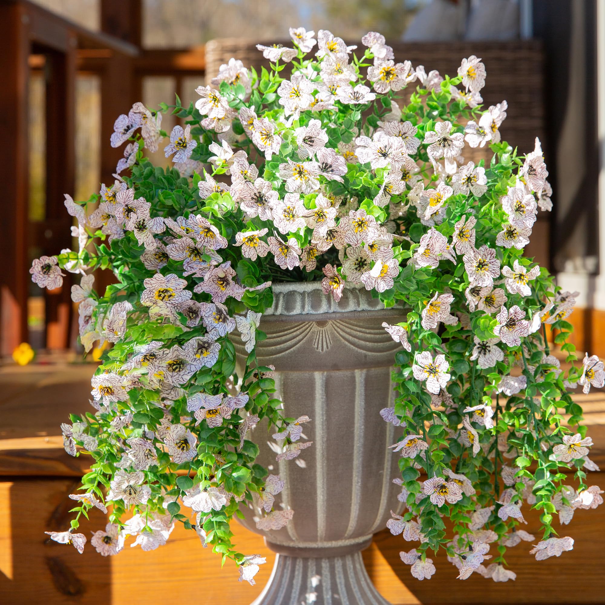 INSPRING fall decorative plants provide lasting porch color.