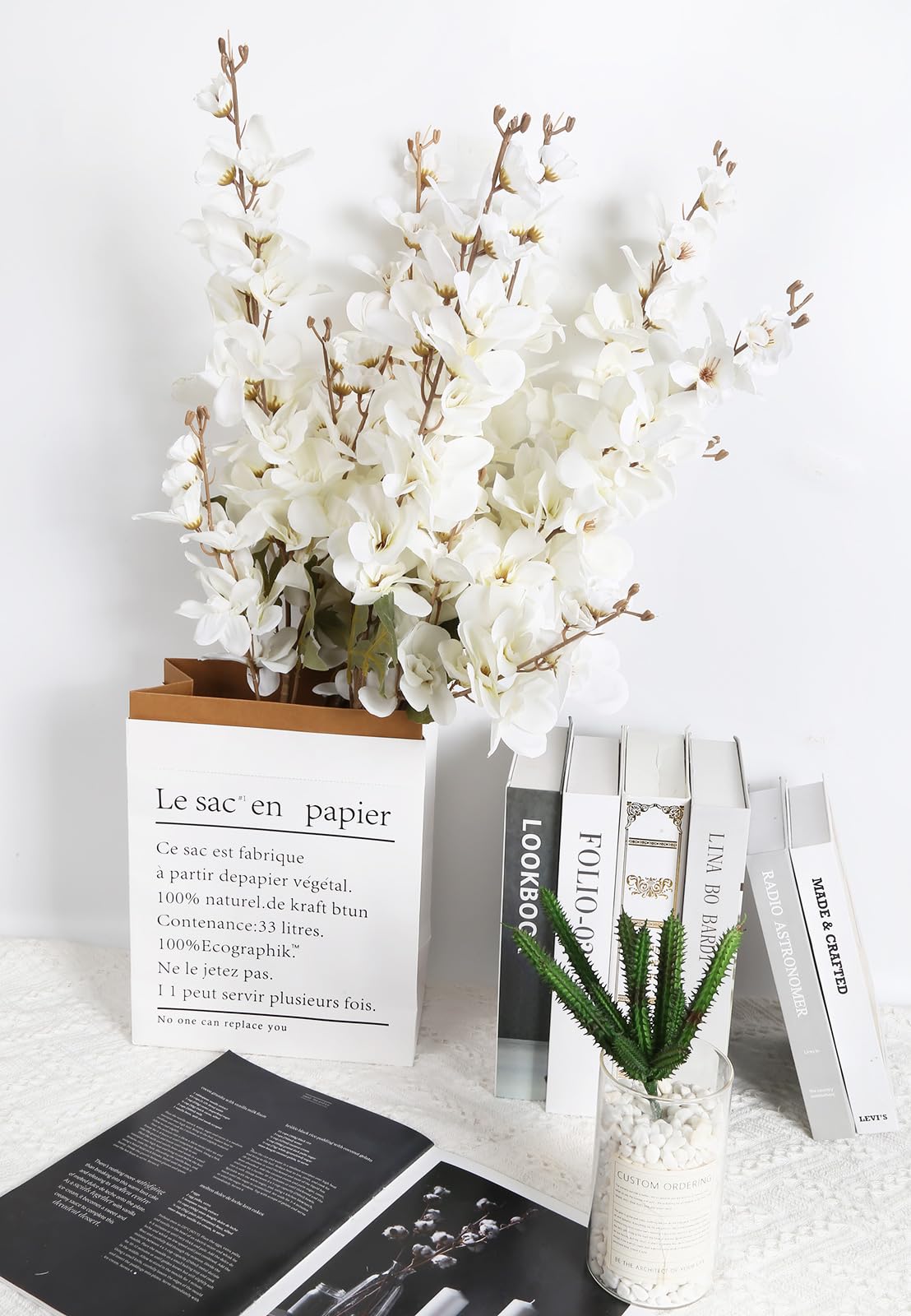 INSUNSIX home decor detail showing silk delphinium stems and soft sheen