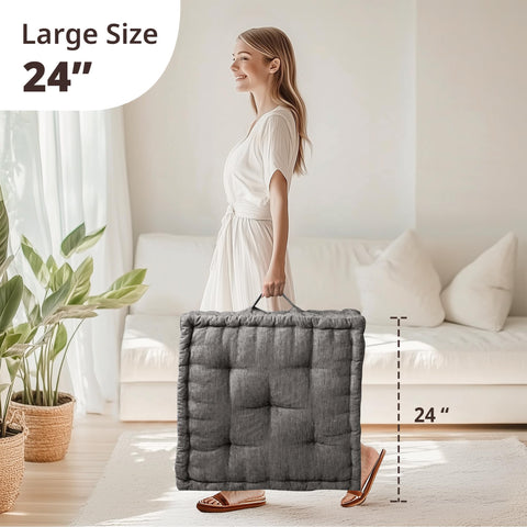 Azza charcoal floor cushion with handle, side view highlighting portability.