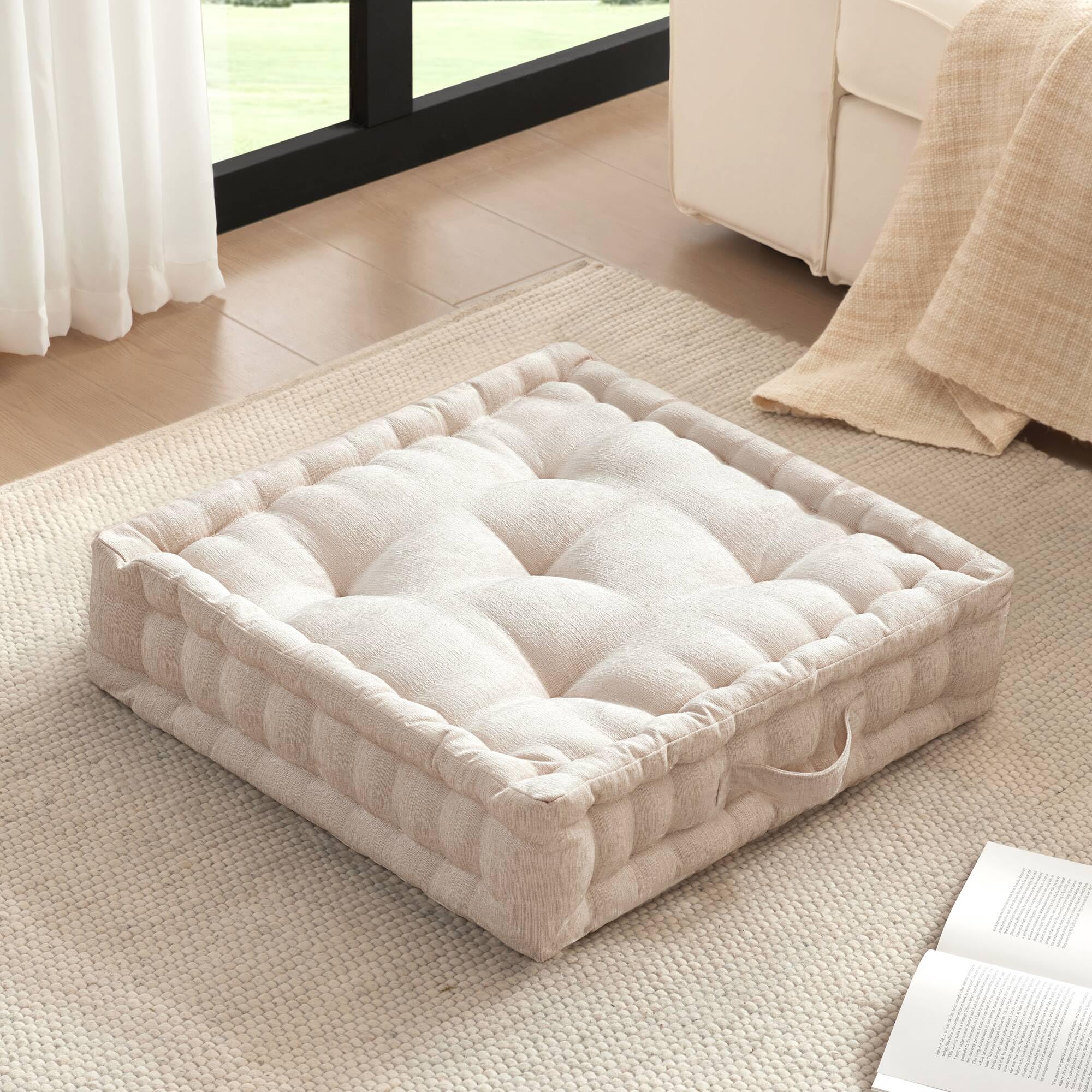 Intelligent Design Azza floor pillow handle close-up for easy transport during lounging.