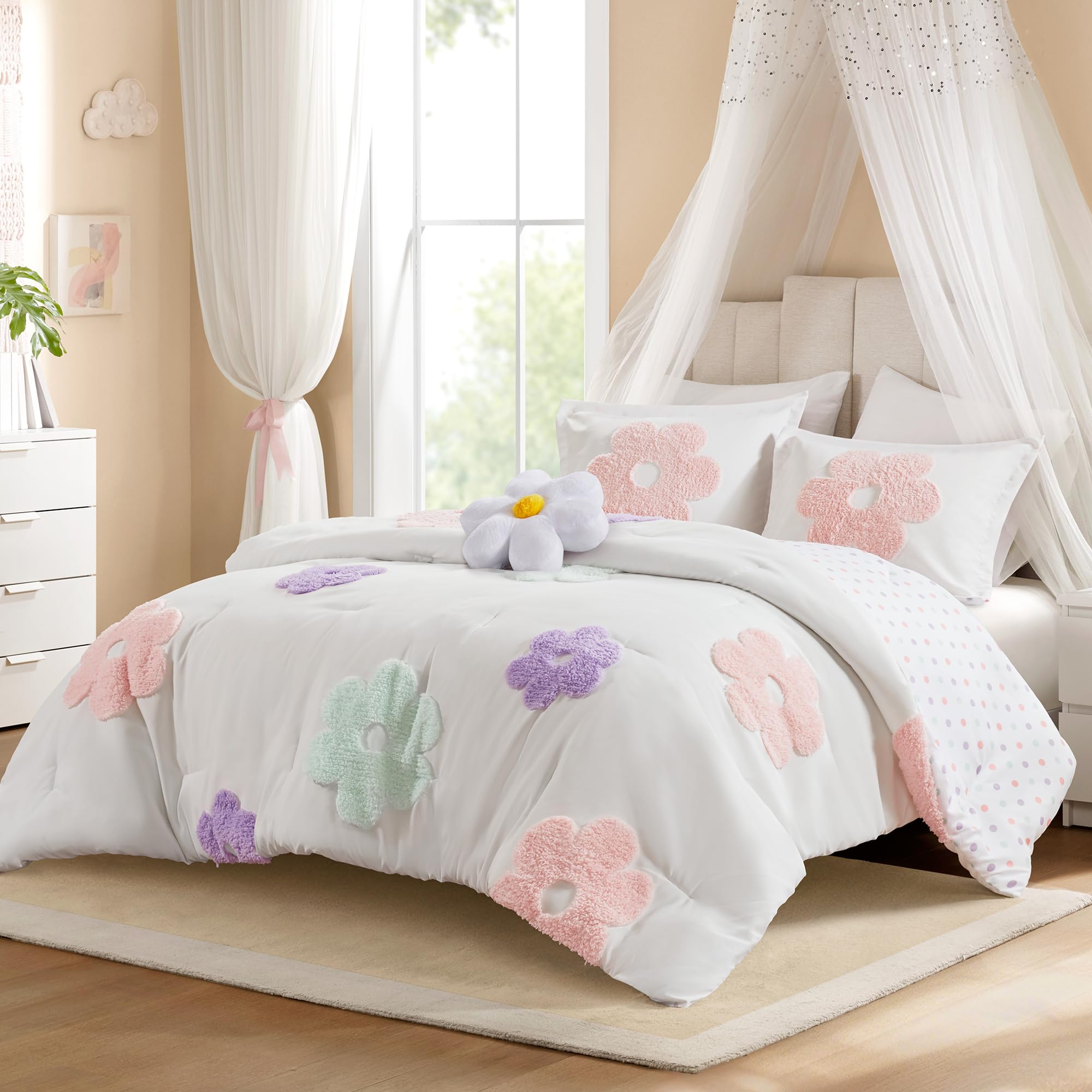 Intelligent Design Gracie floral tufted chenille comforter adds vibrant color to a kid's bed.