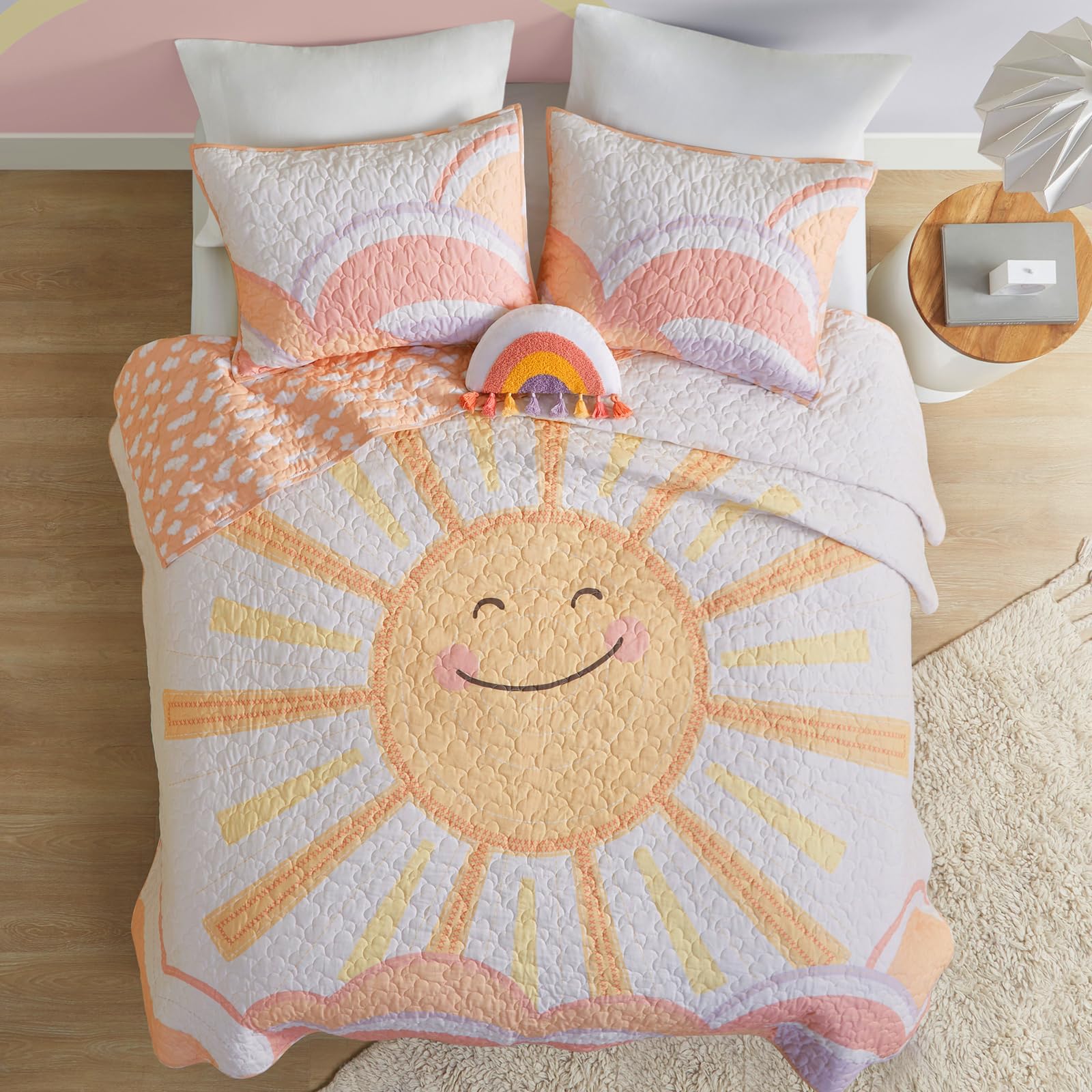 Intelligent Design Kids twin quilt sun and clouds reversible design adds cheerful style.