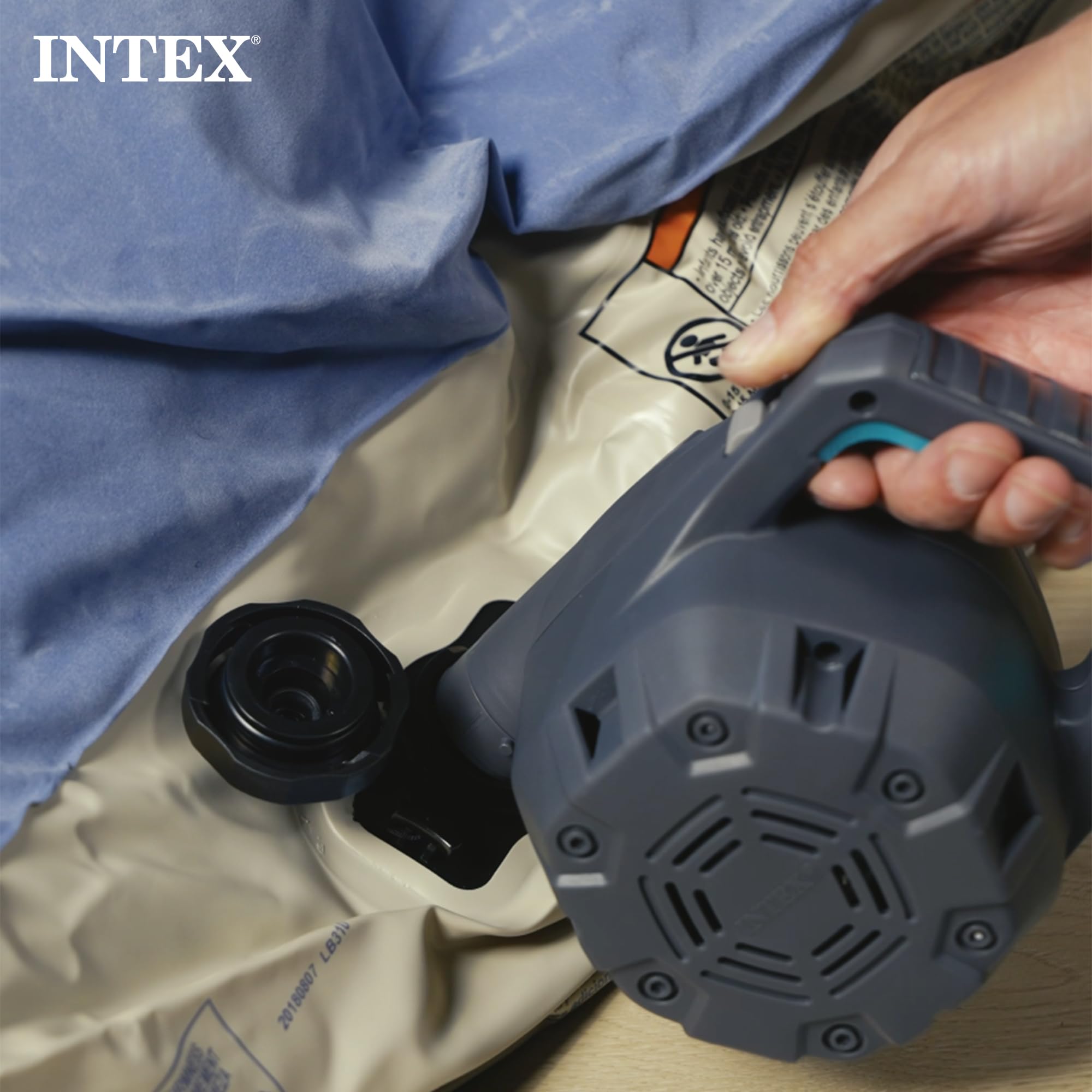 Intex Quick Fill inflating an air mattress for rapid setup.