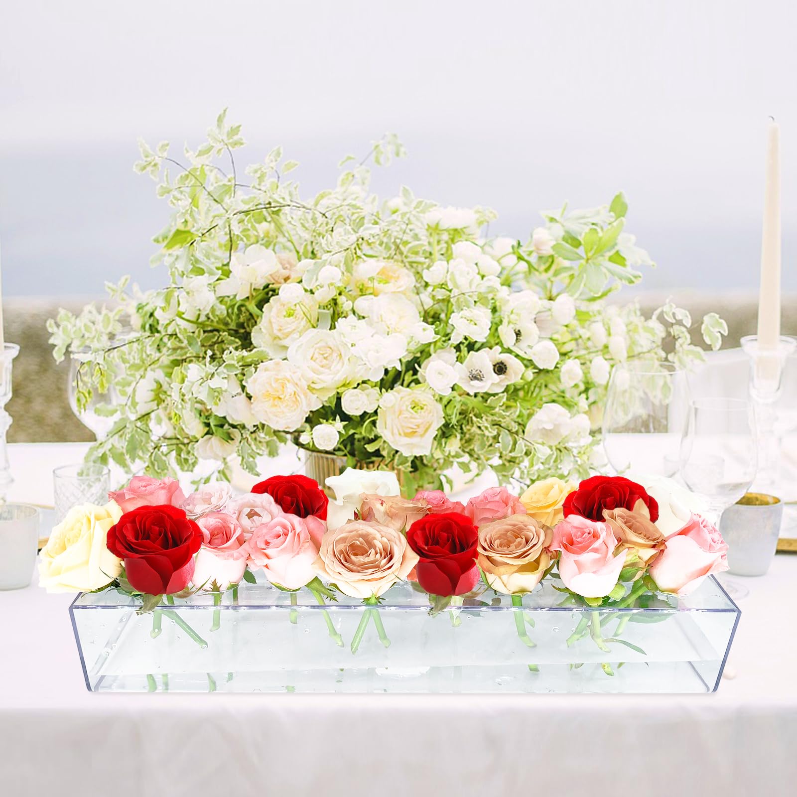 Invariably rectangular vase designed for dining tables to keep sightlines open.