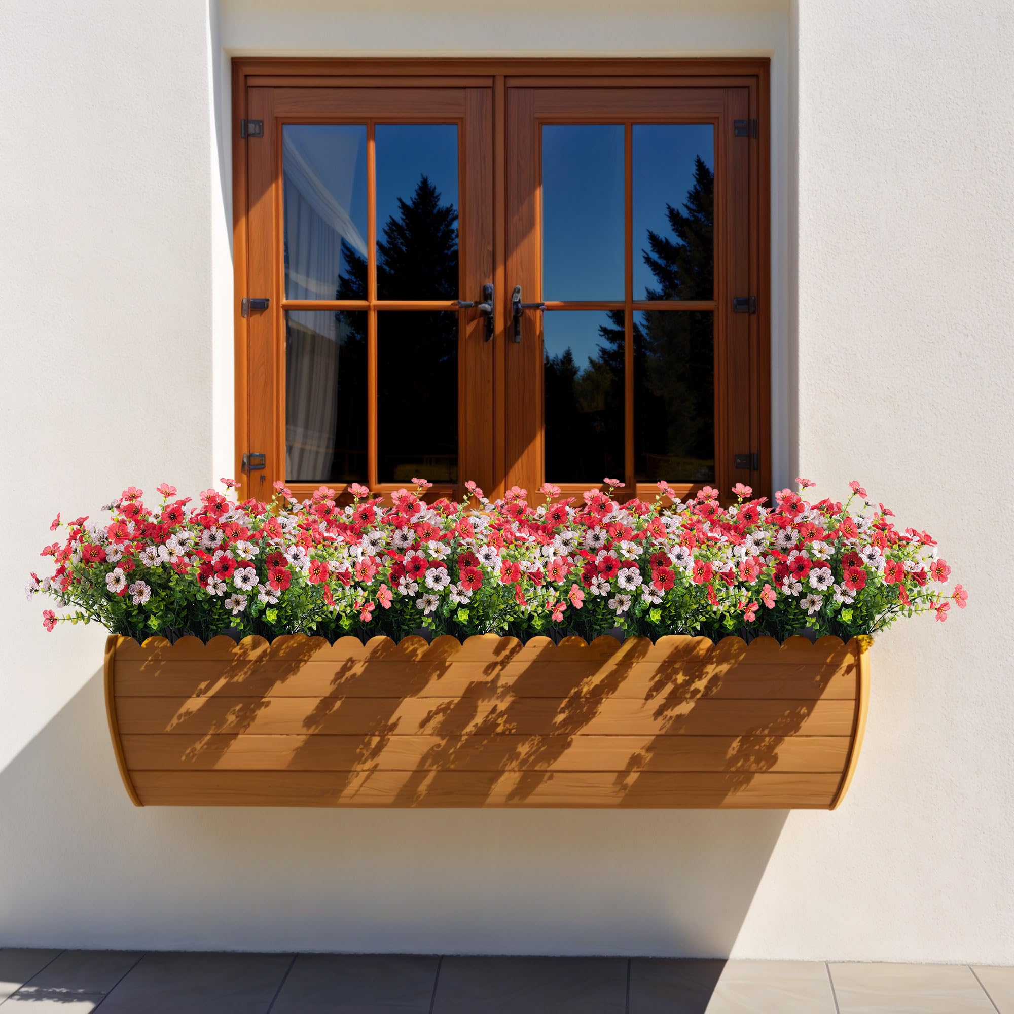 INXUGAO artificial blooms stay vibrant without watering and resist sun exposure.