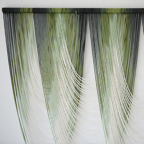 IOWER 57x41 inch macrame wall hanging as focal point in living room