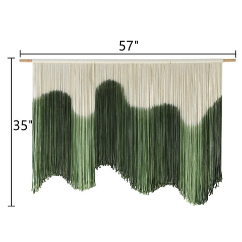 IOWER handmade macrame wall hanging in green gradient adds natural texture to your space above a headboard