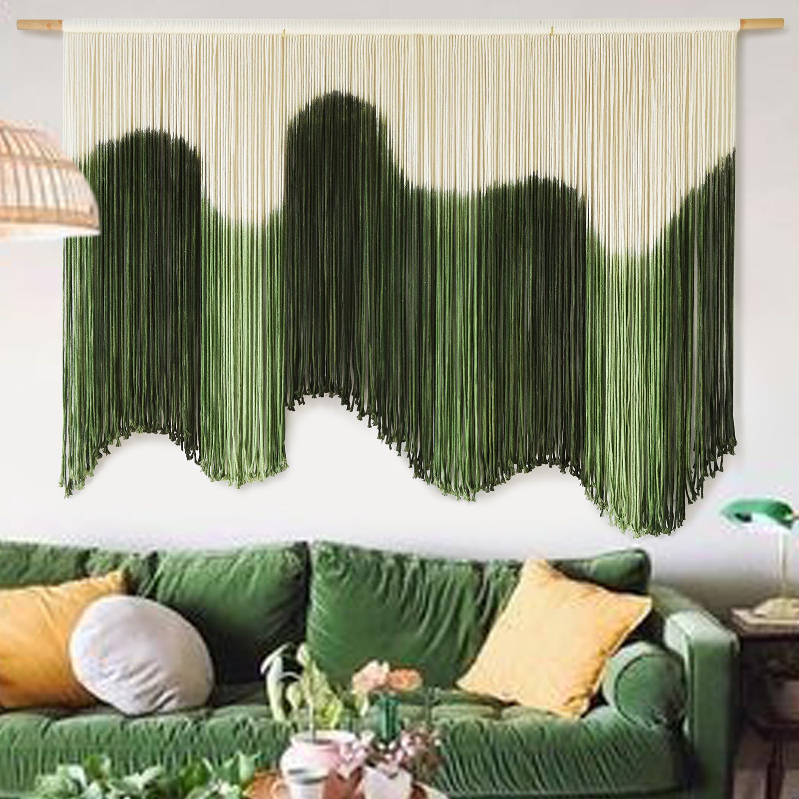 IOWER large macrame wall hanging with green dip-dyed gradient creates a calming focal point above the bed