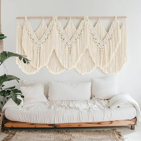 IOWER macrame wall hanging in a living room scene highlighting warm texture and style