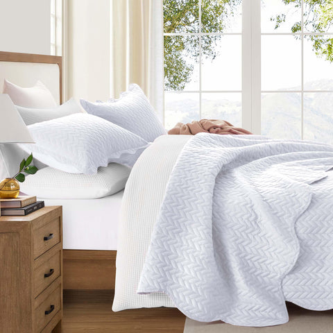 IR Imperial Rooms styled bedroom with embossed white quilt
