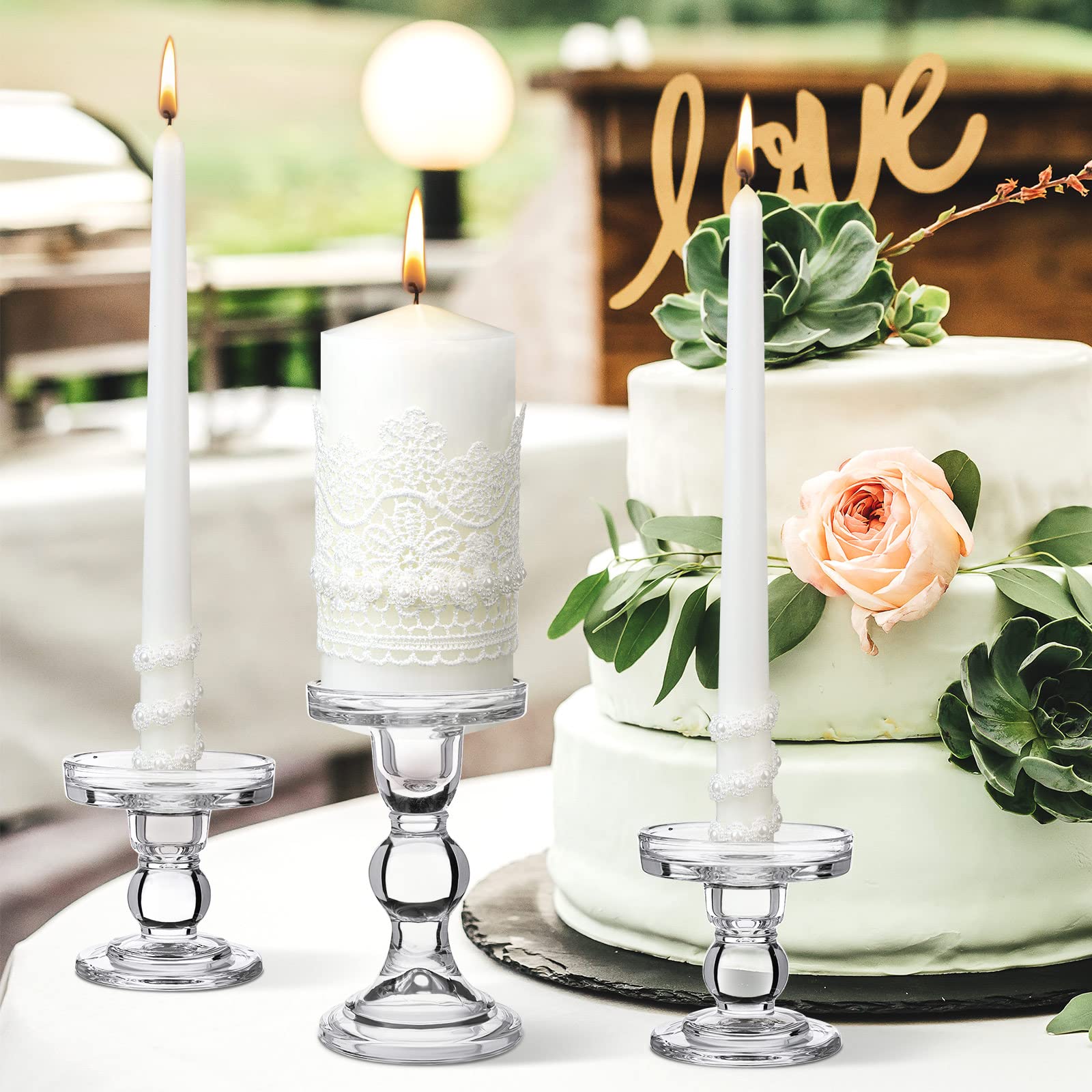 Irenare lace-decorated candles add delicate charm to the ceremony table