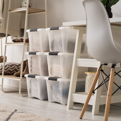 IRIS USA six-pack stackable bins neatly arranged in a closet.