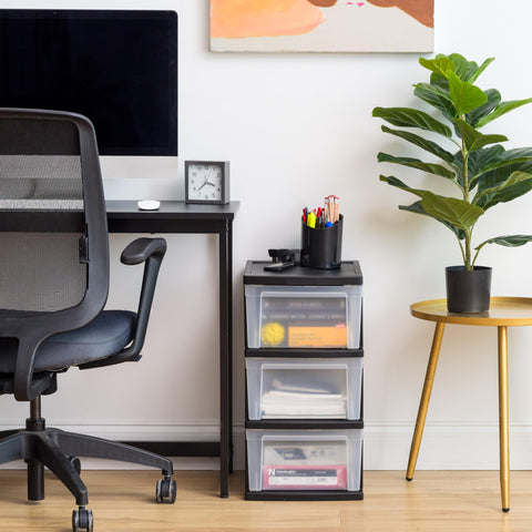 IRIS USA organizer with black frame on a desk surface.