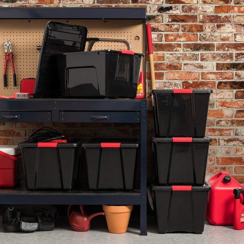 Black IRIS USA garage storage bin blends with workshop shelves.