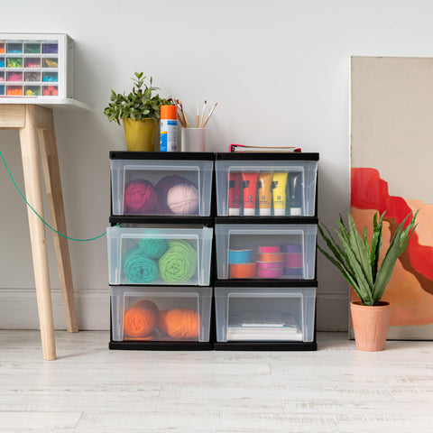 IRIS USA storage with narrow frame in a dorm room setup.