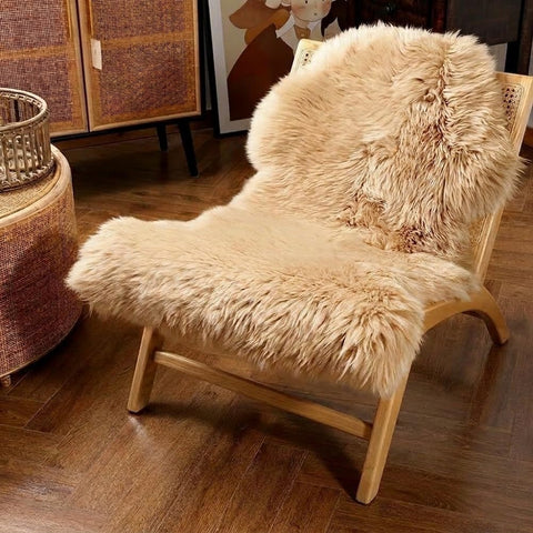 IRIWOOL premium sheepskin rug light brown 2x3 feet adds cozy warmth to any room.