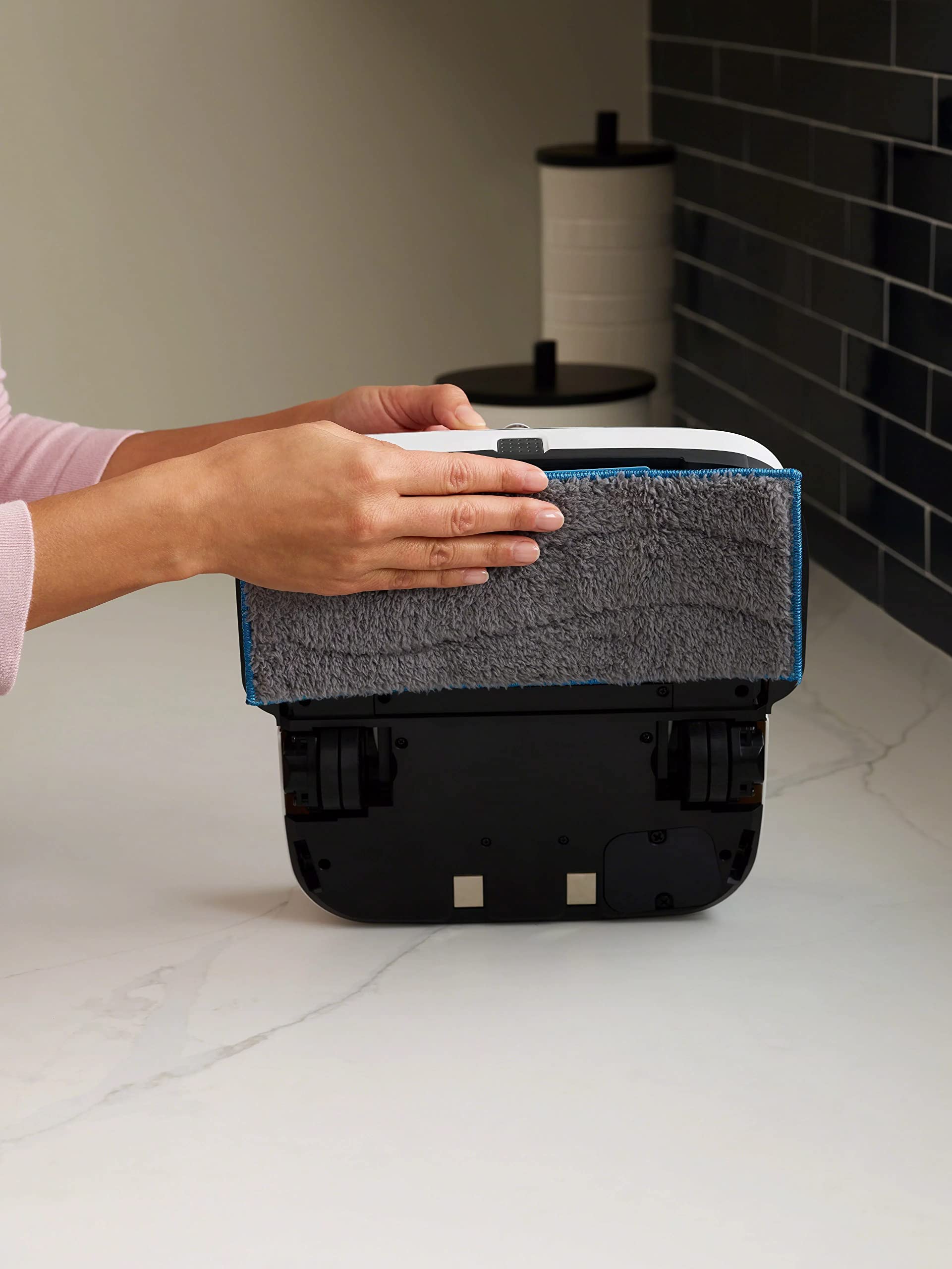 iRobot Braava jet m Series pads on floor ready for effortless cleaning.