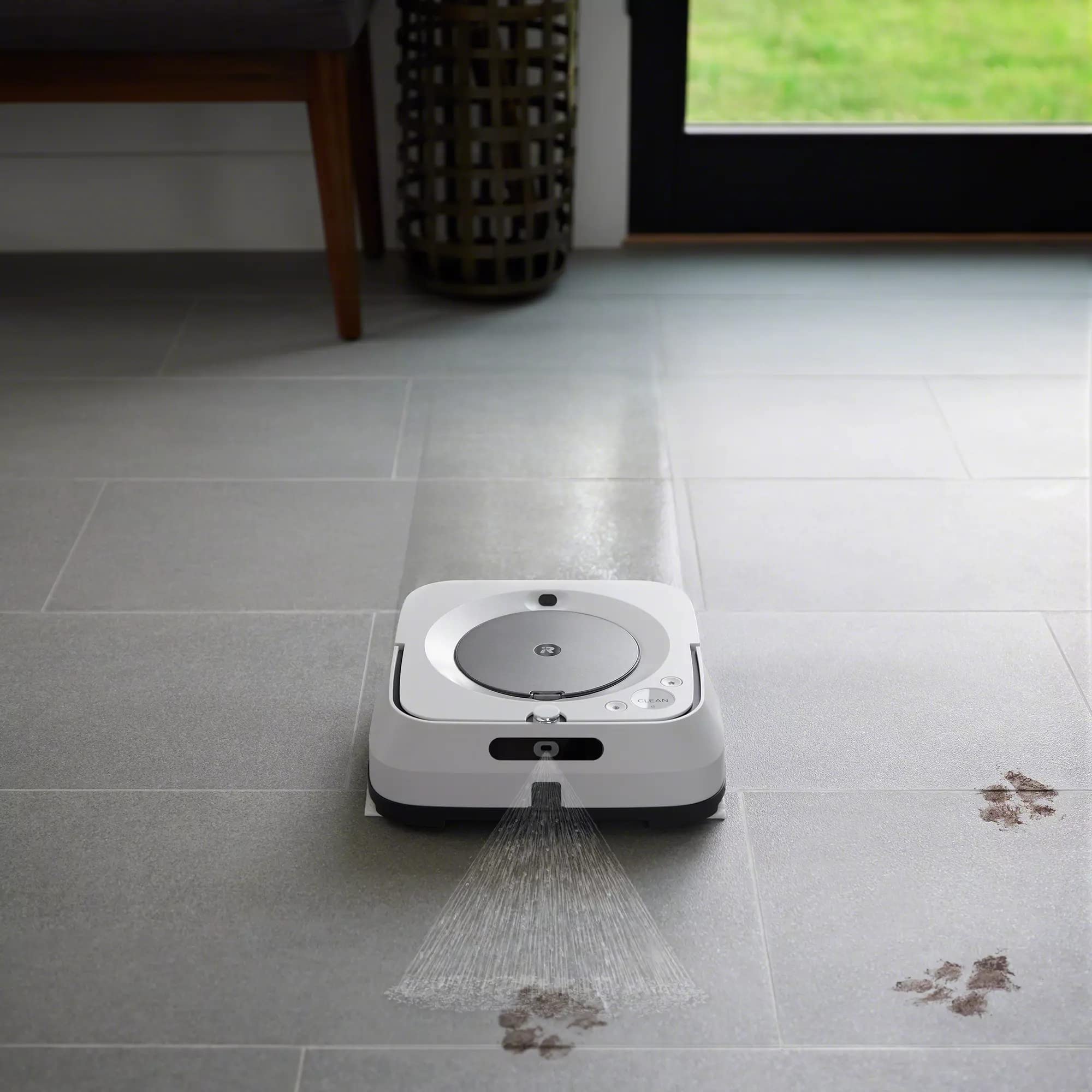 iRobot Braava jet m Series pad close-up shows wicking fibers breaking sticky messes.