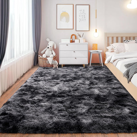Isdook Non-Slip Bottom Fluffy Rug stays in place on wood floors.