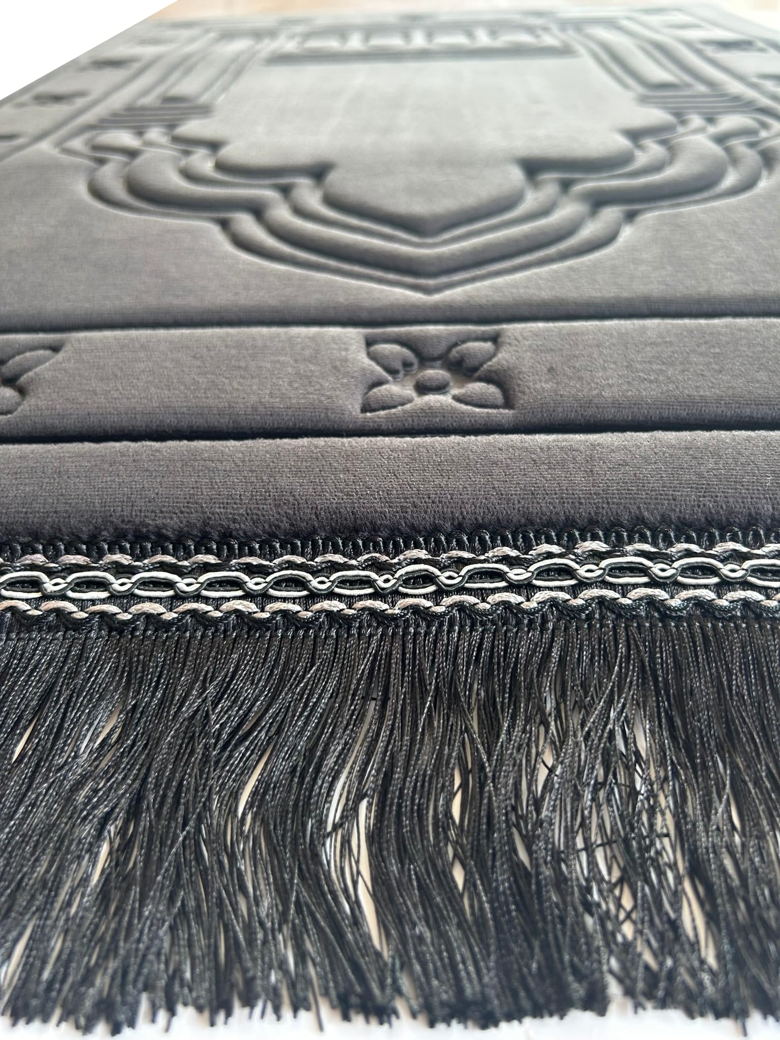 Islamika black luxury prayer rug features an elegant pattern for home or masjid