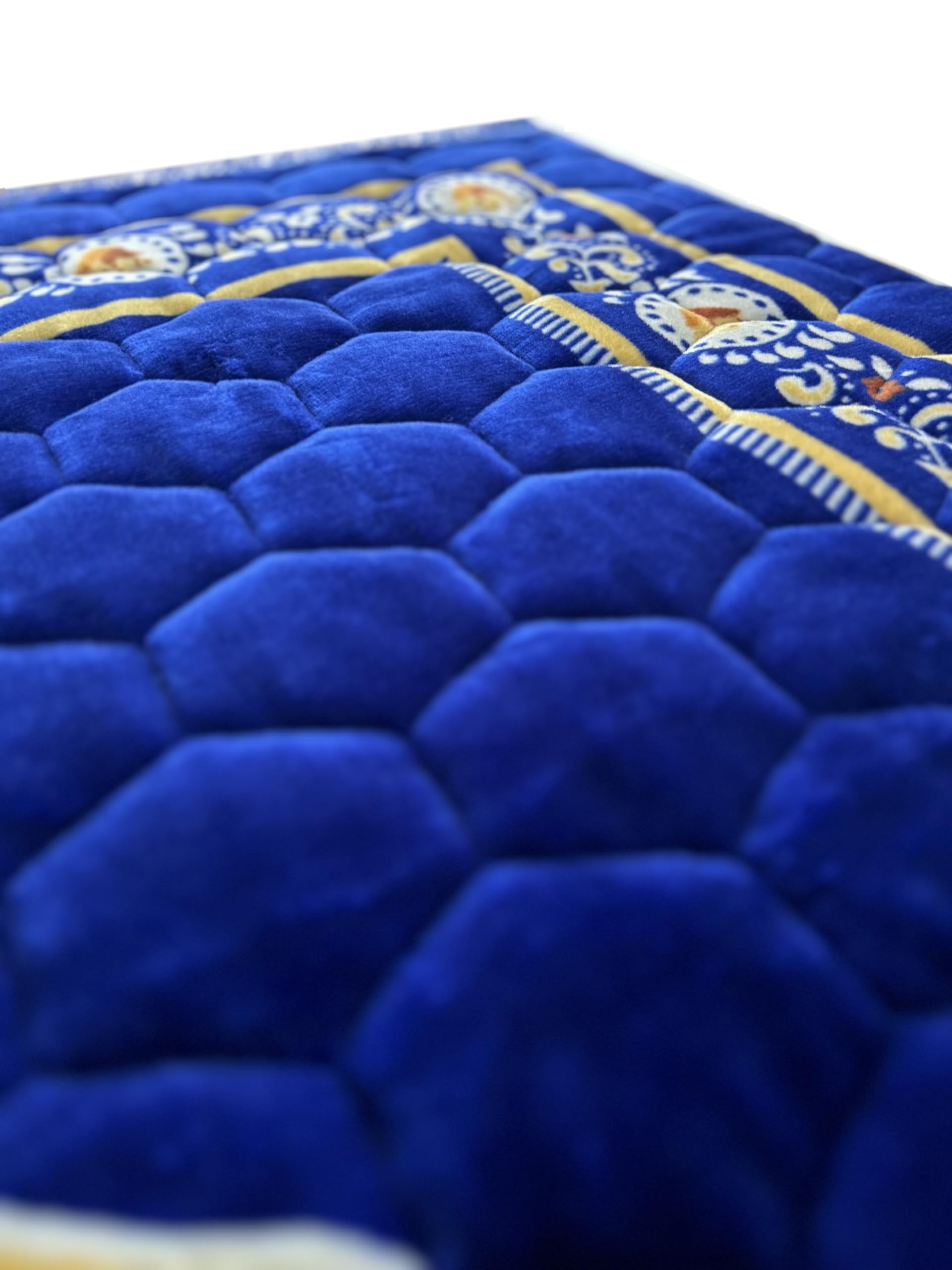 Islamika 33-bead prayer set shown beside the rug for tasbeeh.