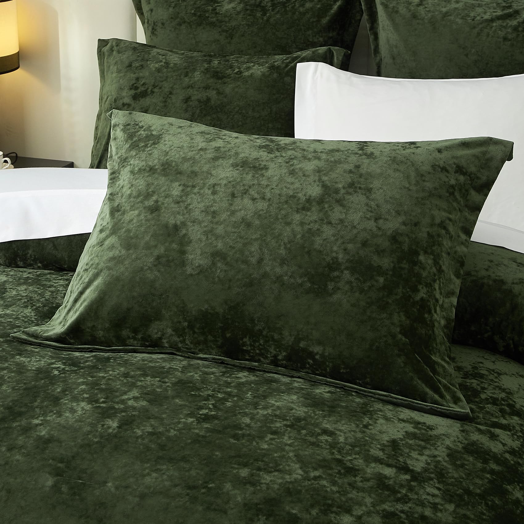 Ivellow pillow shams complete the king size velvet set.