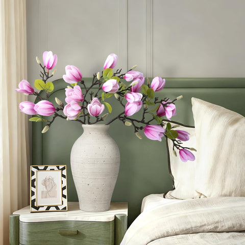 Ivydale artificial magnolia stems arranged in a vase for stylish decor.