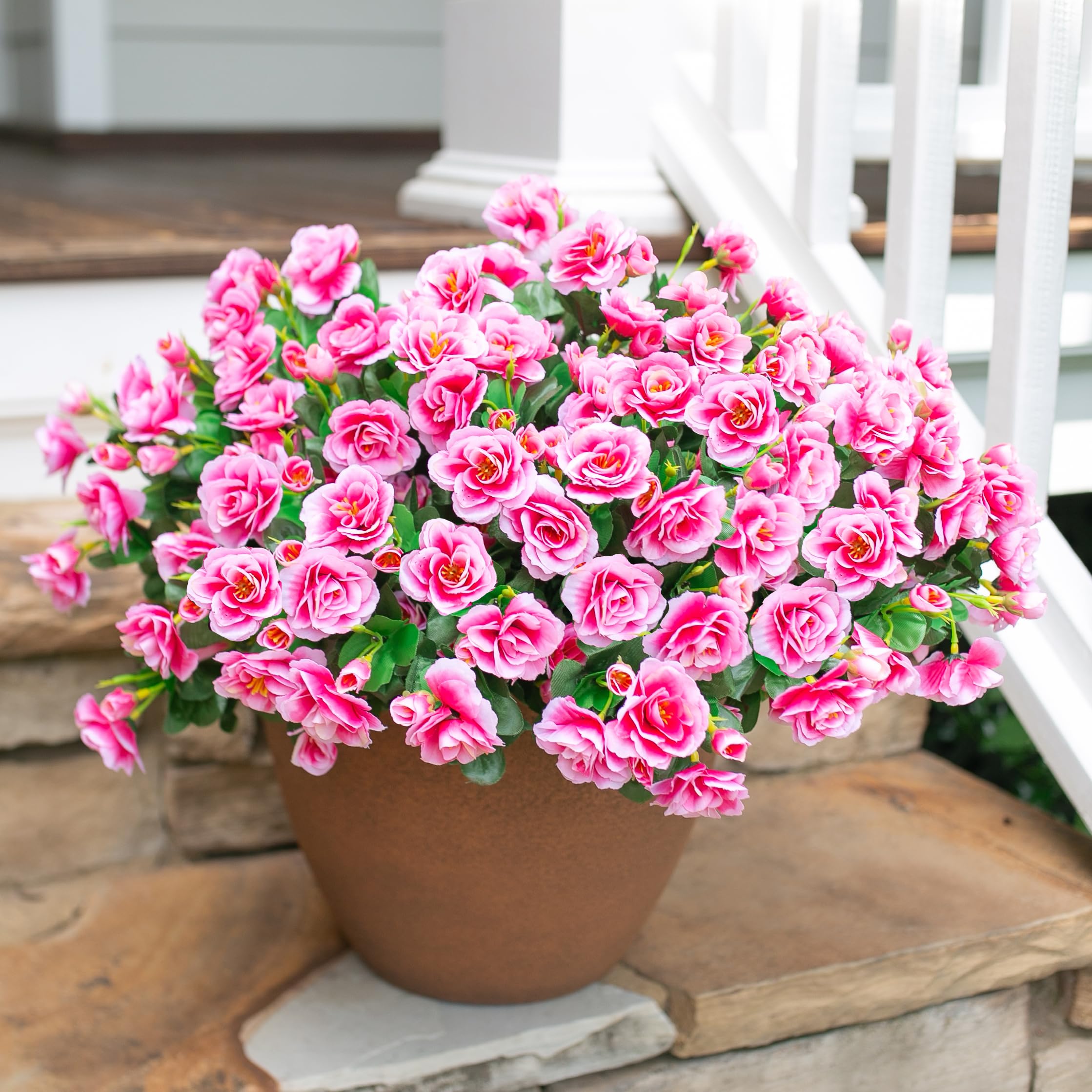 Ivydale front door decor camellia blooms create a welcoming entrance.