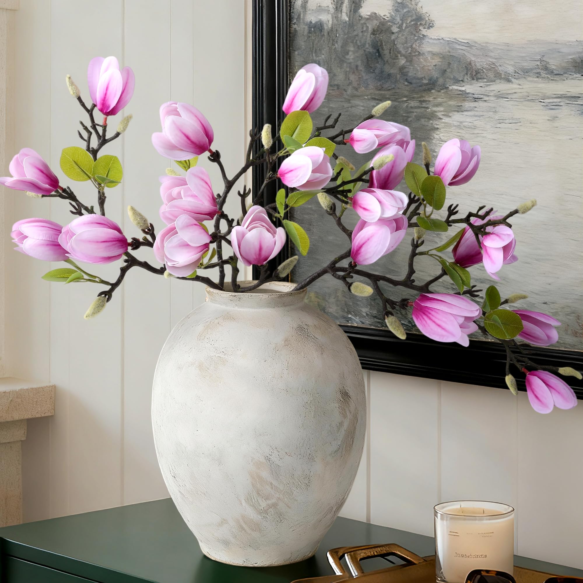 Ivydale hotpink magnolia stems closeup showing detailed petals and leaves.