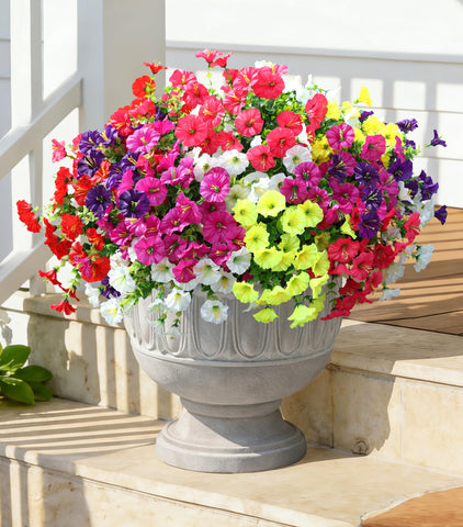 Ivydale outdoor fake flowers arranged in planters for porch or yard.