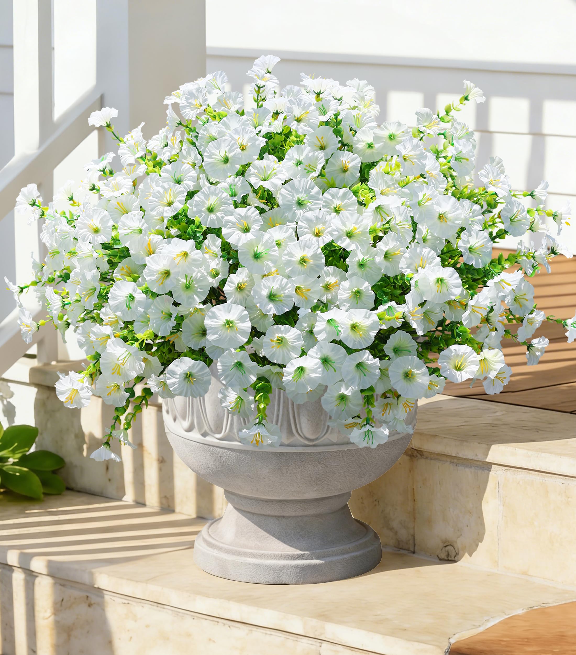 Ivydale close up of white silk blooms and eucalyptus leaves
