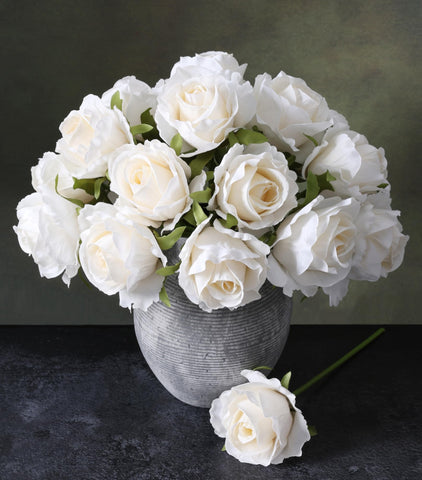 Ivydale white roses bouquet closeup for elegant wedding decor.