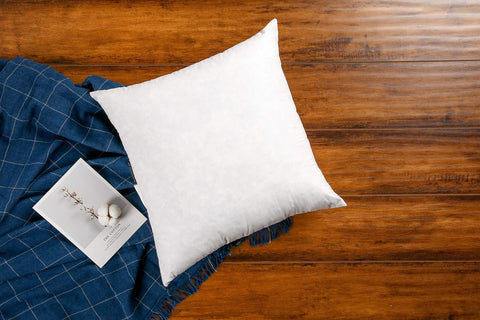 JA COMFORTS 63oz feather-fill provides supportive loft for lounging.