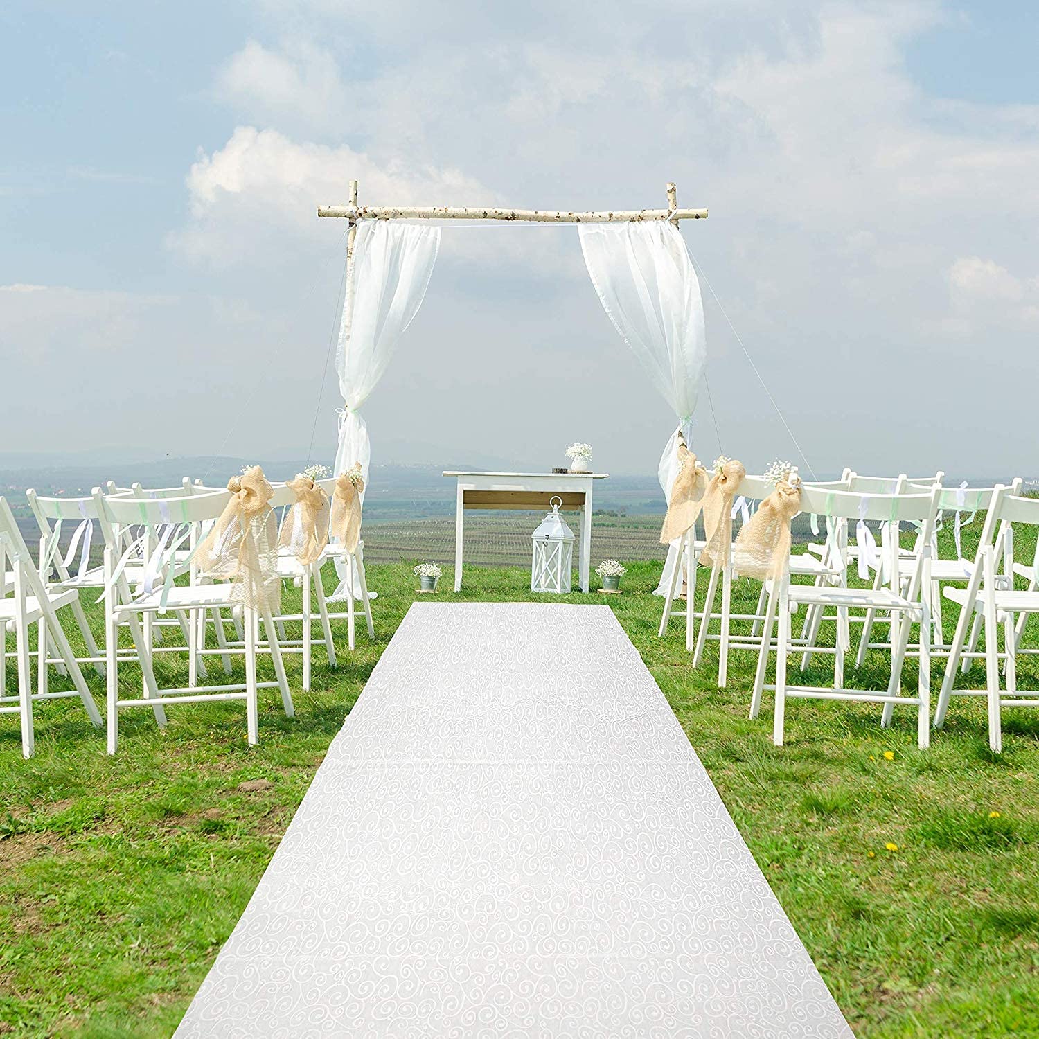 J&A Homes outdoor venue setup showing versatile aisle runner