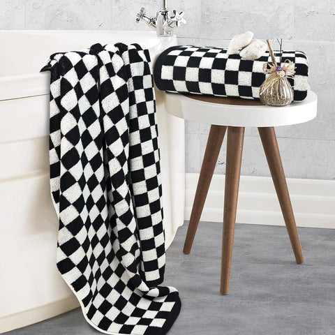 Jacquotha towels 2-pack in basket showcases bold bathroom decor.