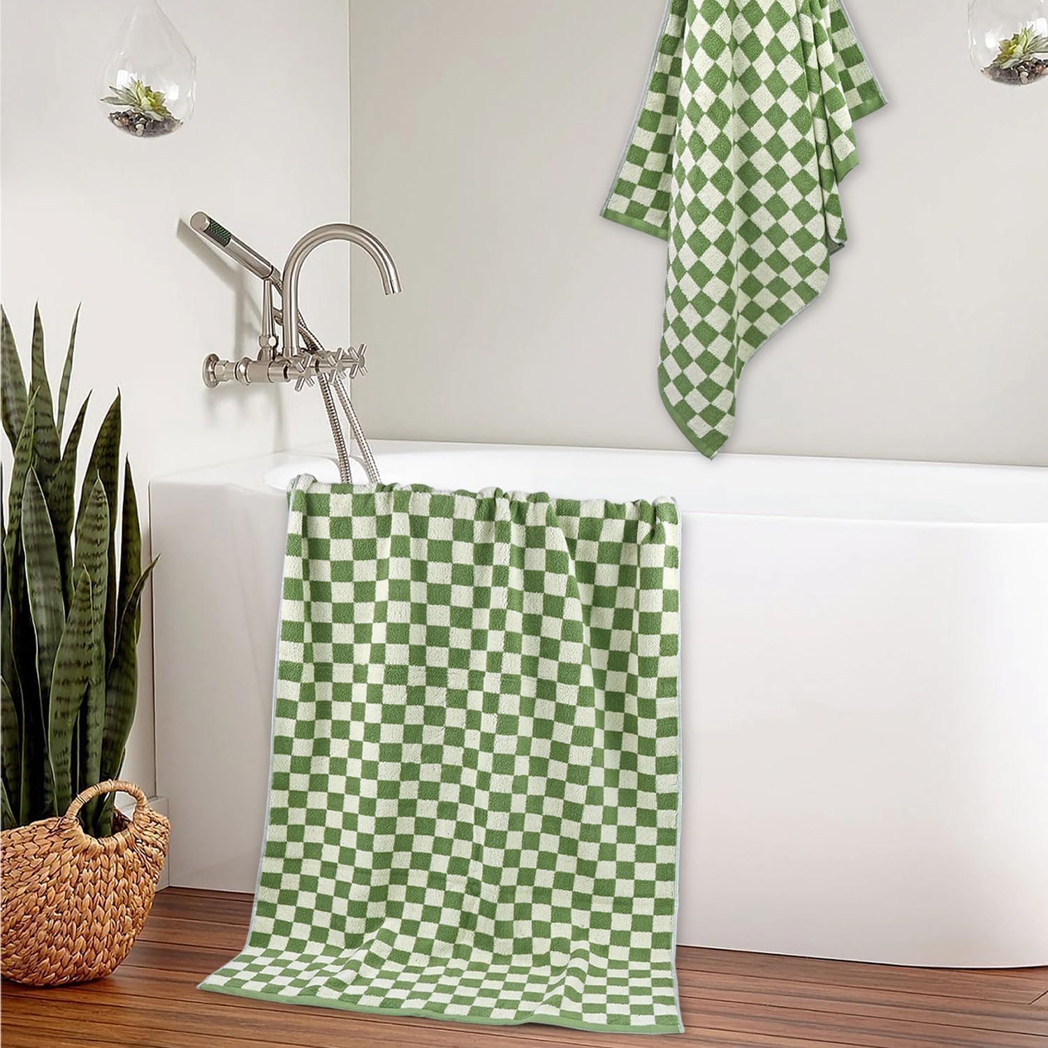Jacquotha green checkered towels add durable style to any space.