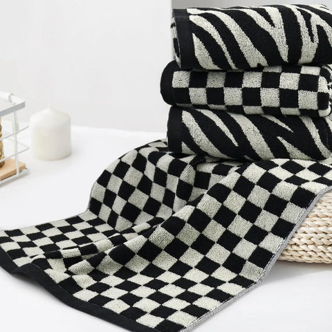 Jacquotha towels with a zebra pattern offering stylish functionality in kitchen or bath spaces.