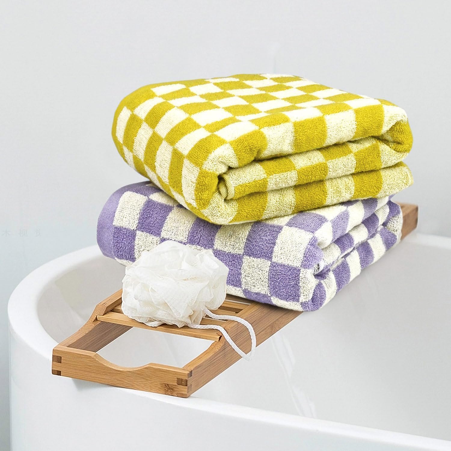 Jacquotha towel in soft 100% cotton for post-shower comfort.
