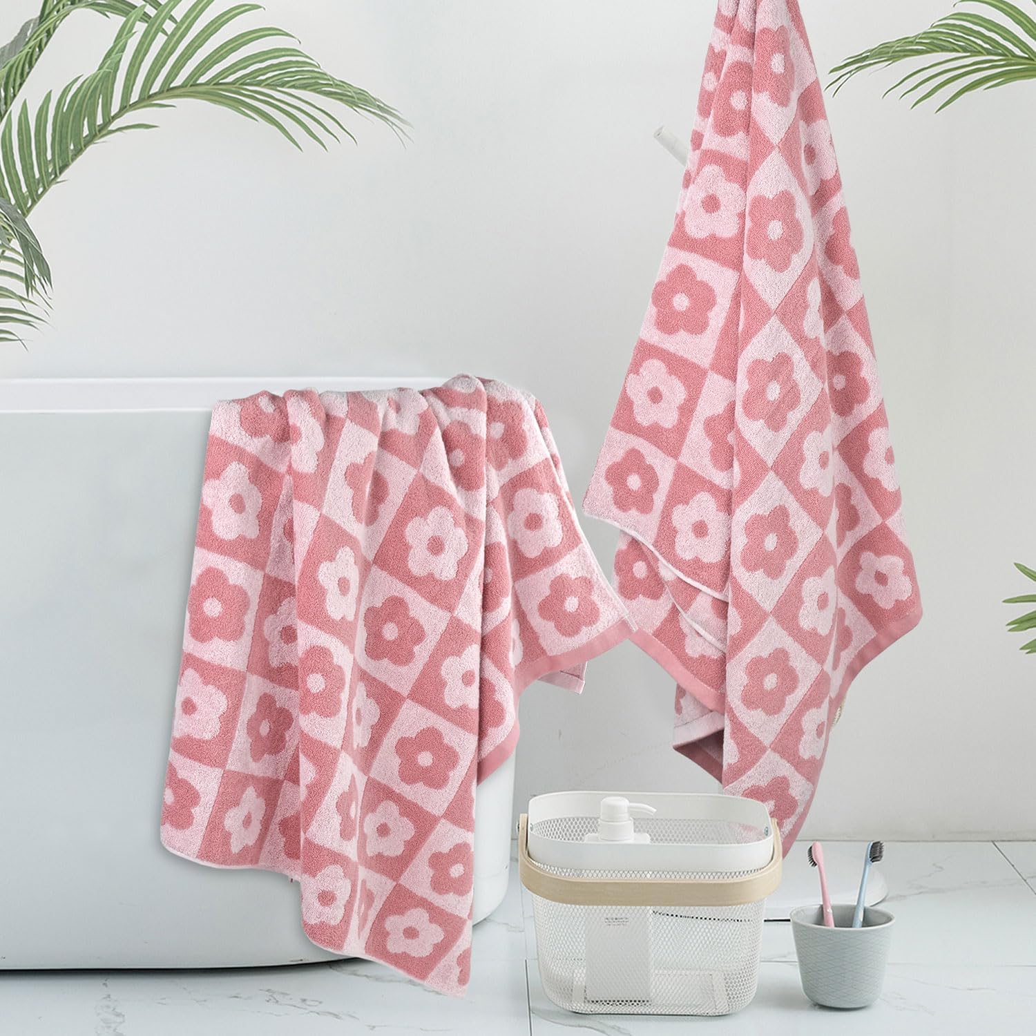 Jacquotha checkered floral towels on hanger highlighting colorfast pink tones.