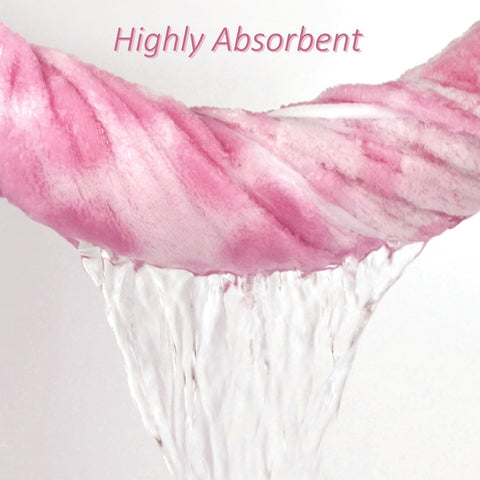 Jacquotha six-petal jacquard pattern on pink towel.