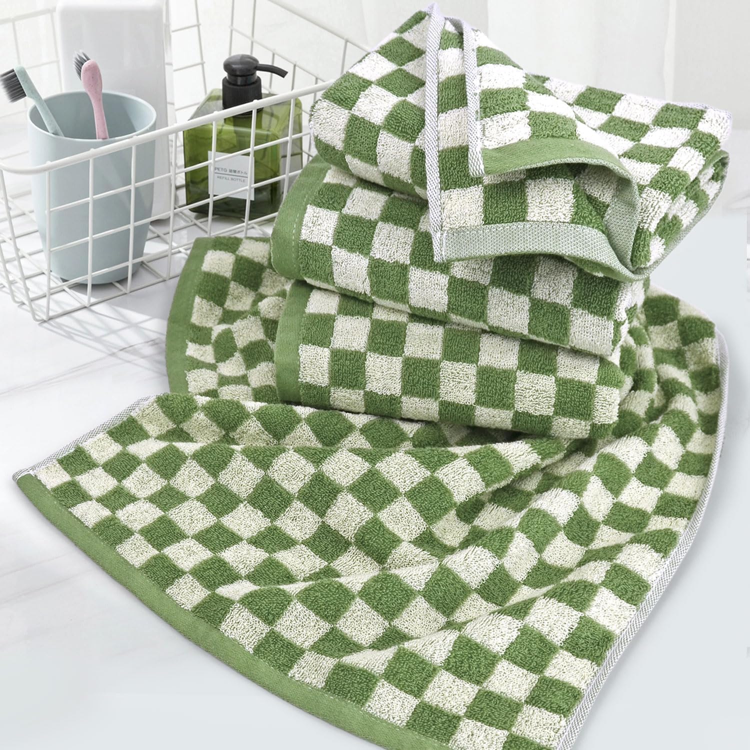 Jacquotha towels on rack demonstrate bathroom and kitchen versatility.