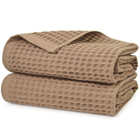 Jacquotha waffle bath towels tan laid flat, 2-piece set, soft and absorbent.