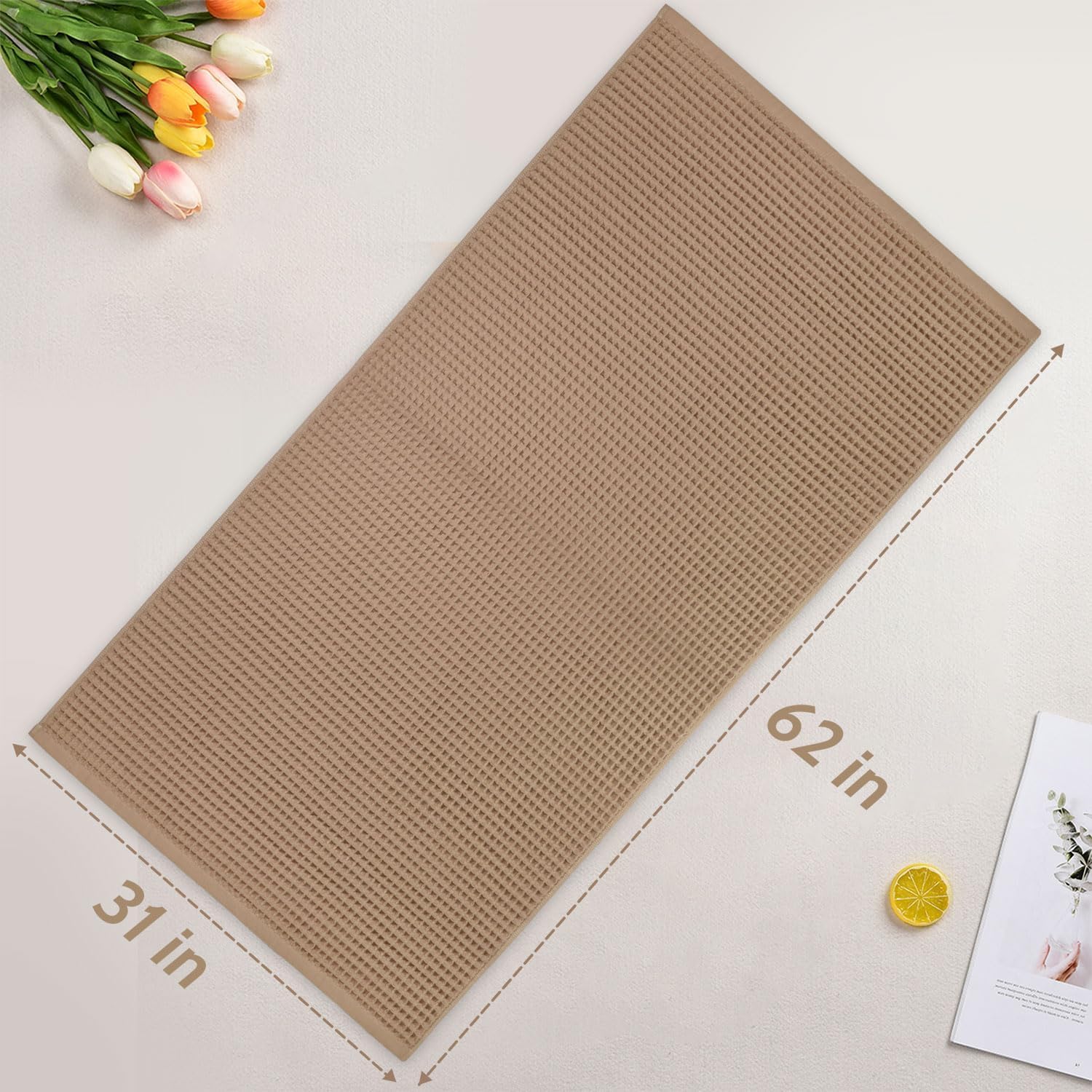 Jacquotha waffle towels folded, showcasing generous 31x62 inch size.